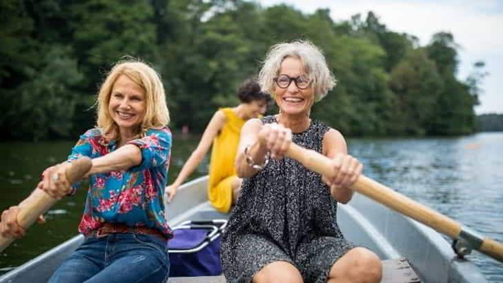 older ladies rowing to keep fit